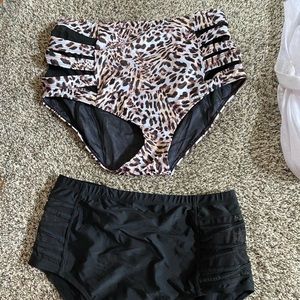 Torrid Swimsuits. 3 barely used. Two tops & two bottoms to mix and match. 0 & 00